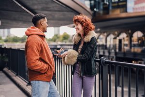 woman talking to guy about her social media growth